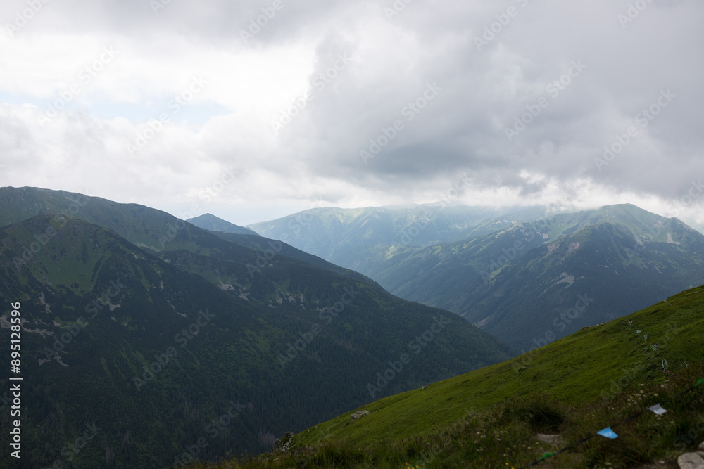 Mountains of Poland. Beautiful panorama of the mountain range. Mountains separating several countries. Tourist resort in Europe. Mountains of Poland. Beautiful panorama of the mountain range. Mountains separating several countries. Tourist resort in Europe.