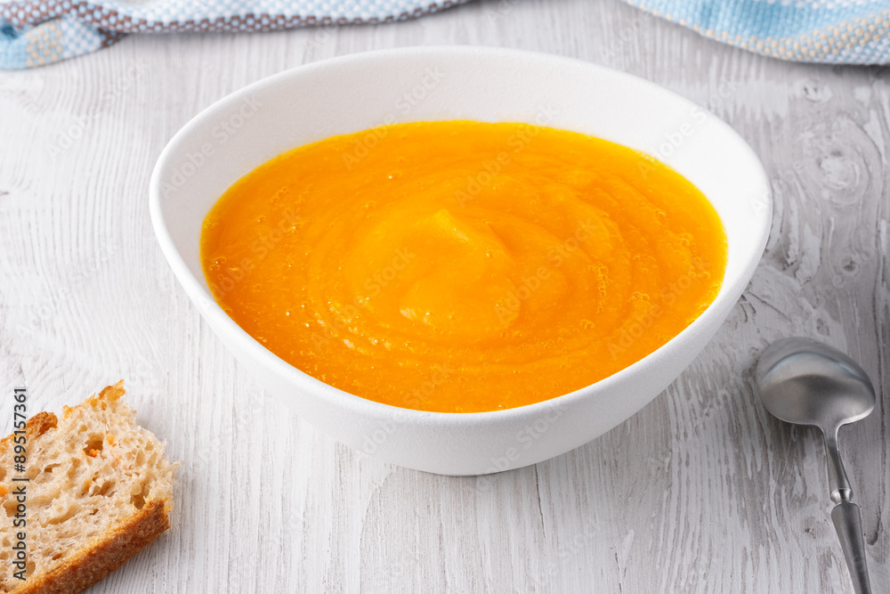Pumpkin soup on white background Pumpkin soup on white background