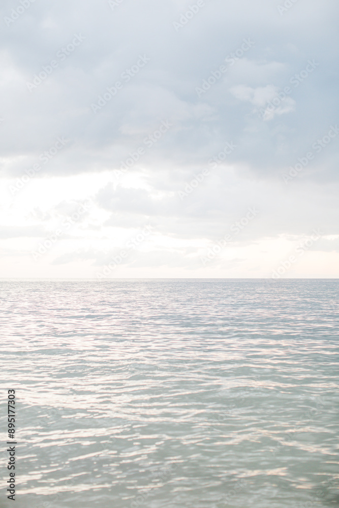 Fototapeta premium blue ocean with sky with clouds