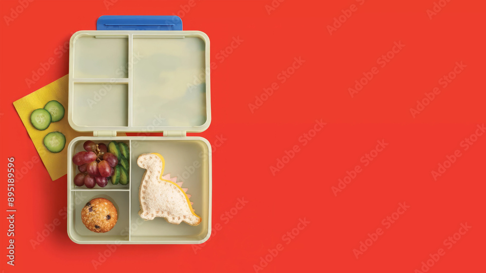 Closeup of small bento lunchbox isolated on copy-space background. Closeup of small bento lunchbox isolated on copy-space background.