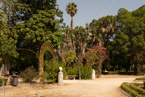 A path winds through a lush...