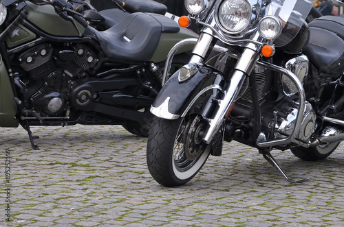 Lot of classic motorcycles parked in a park