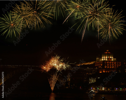 Fogo de artifício na baixa da cidade do Porto com a Serra do Pilar e Ponte Dom Luís de fundo, festas populares de São João, Portugal photo