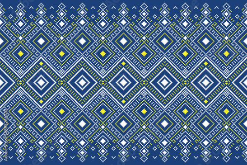 Fabric pixel abstract geometric pattern Thai stye on blue background. Design for clothing, fabric, background, wallpaper, wrapping, batik. Knitwear, Embroidery style. Aztec geometric art ornament