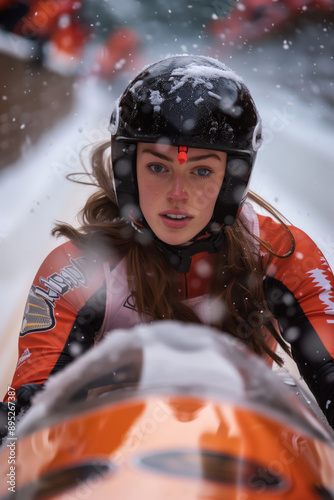 A Bobsledder's Focused Gaze During a Snowy World Cup Race photo