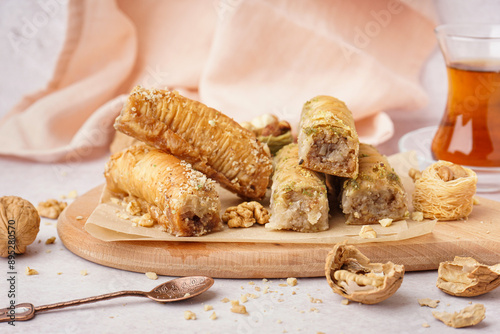 Wooden board with tasty bak...