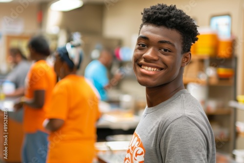 Young African American male volunteer at community center