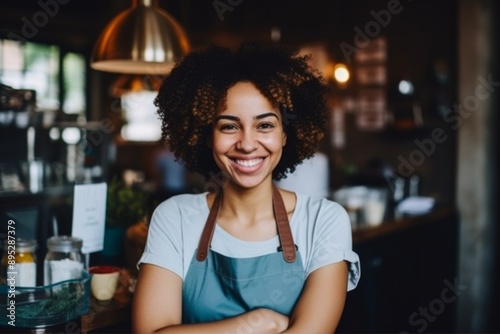 Portrait of a smiling African American female barista