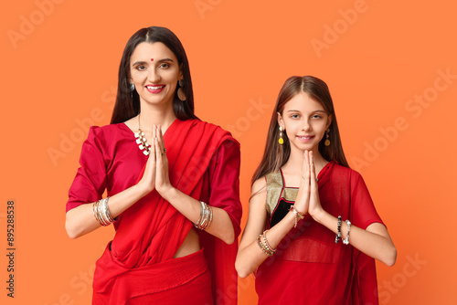 Mother with her daughter in...