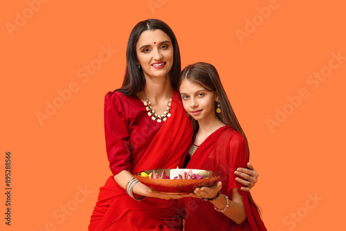 Mother with her daughter in...