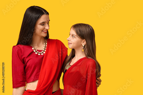 Mother with her daughter in...