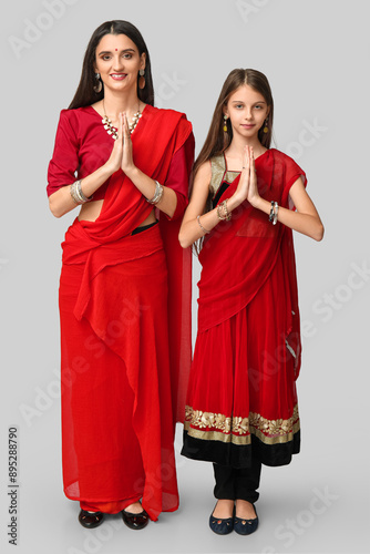 Mother with her daughter in...