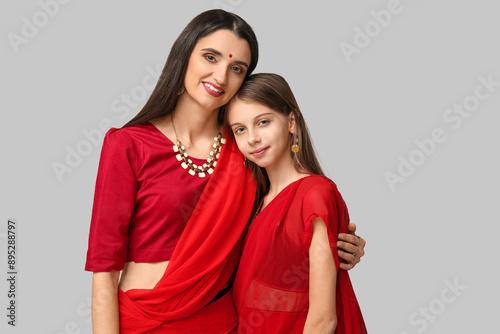 Mother with her daughter in...