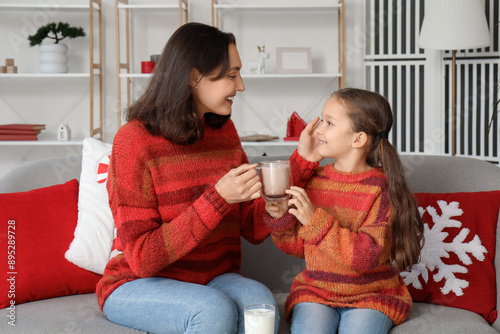 Young mother and her little...