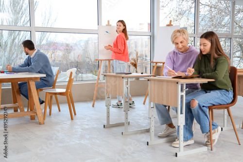 Young students having lesson in art school