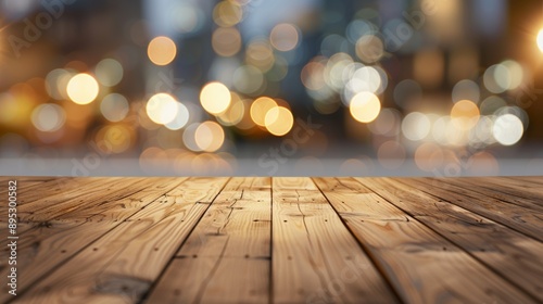 A wooden table with a view of the city lights in the background