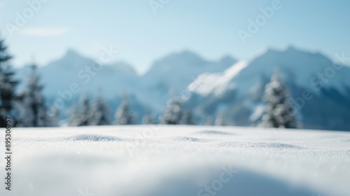 A snowy mountain range with a clear blue sky