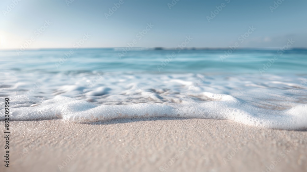 A beautiful image of soft ocean waves gently caressing the sandy beach shore, with a clear blue horizon creating a calm and soothing beachside scene for relaxation. A beautiful image of soft ocean waves gently caressing the sandy beach shore, with a clear blue horizon creating a calm and soothing beachside scene for relaxation.