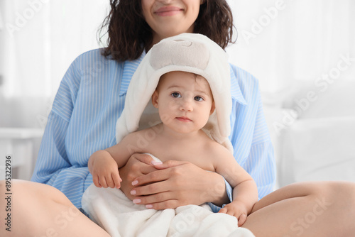 Mother and her baby with to...
