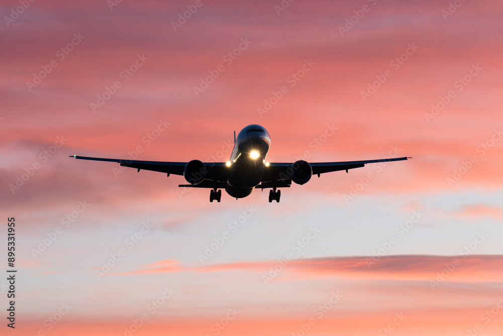 airplane landing at sunrise, golden hour, airport traffic, aviation industry airplane landing at sunrise, golden hour, airport traffic, aviation industry