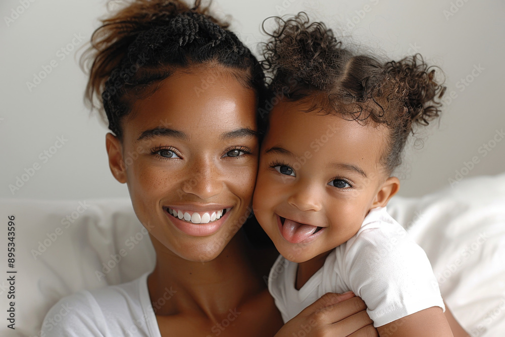 Mom and baby smile and play. African American family Mom and baby smile and play. African American family