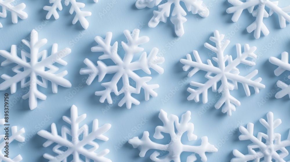 A blue background with a bunch of white snowflakes A blue background with a bunch of white snowflakes