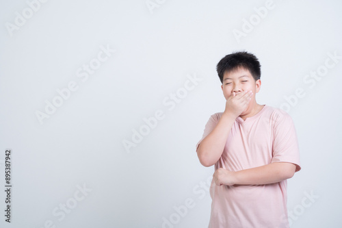 boy on white background, sleepy child