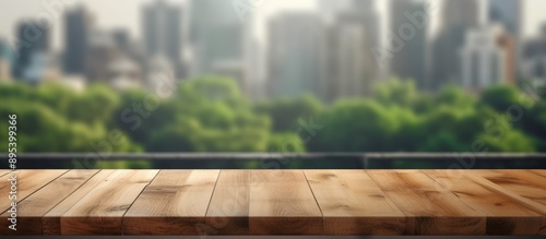 Wooden Tabletop with Cityscape Background © waliyah