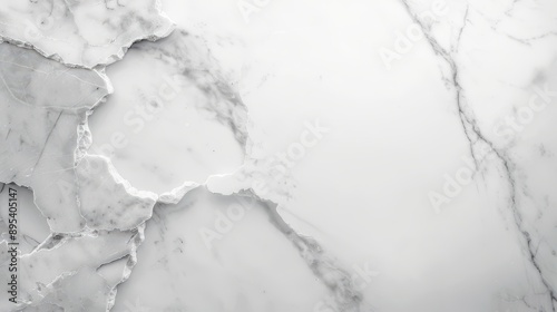 A white marble wall with a crack in it