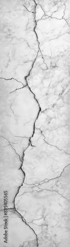 A crack in a white marble wall