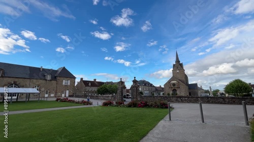 The chateau at the centre of Ranes France with blue sky and empty street. photo