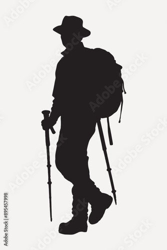 Silhouette hiker trekking poles outdoors