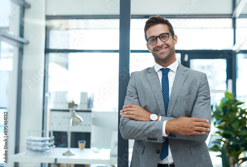 Crossed arms, confident and portrait of businessman in office with ambition for finance career. Happy, corporate and male financial specialist with pride for company revenue and wealth management.