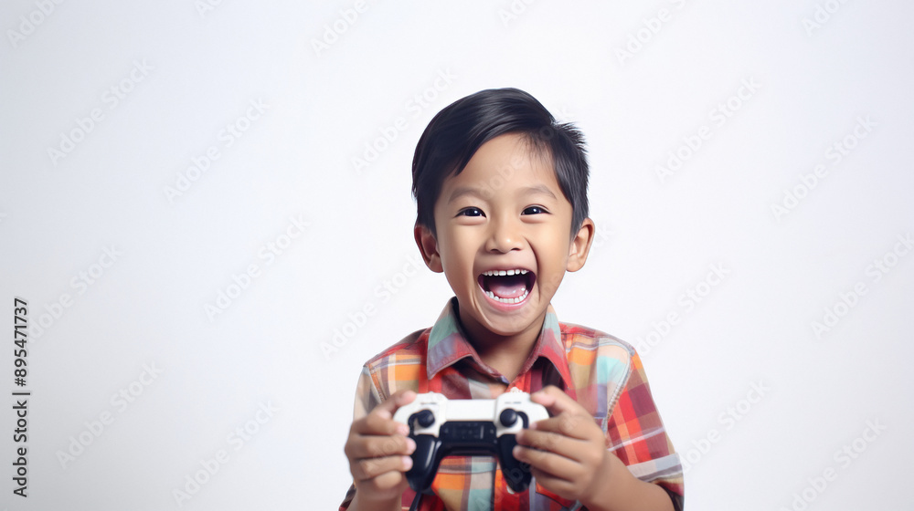 Cute excited little boy holding remote on white background Cute excited little boy holding remote on white background