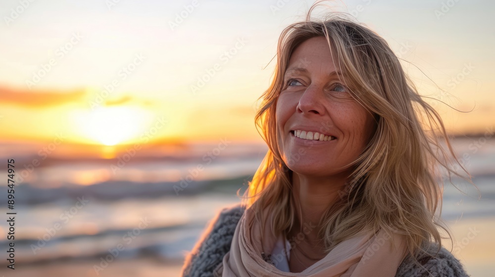 Mature Woman Breathing Ocean Air on Beach at Sunset, Smiling and Happy Mature Woman Breathing Ocean Air on Beach at Sunset, Smiling and Happy