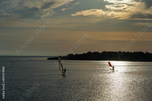 Windsurfing on the bay on the Hel Peninsula in the Baltic Sea 2.06.2024