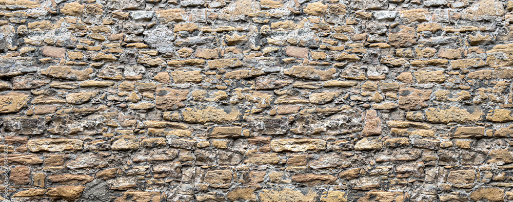 Obraz premium brown stone wall