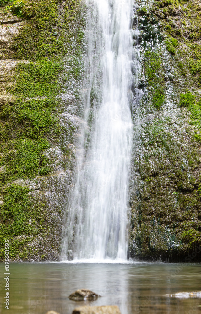 Waterfall on the river in nature in summer Waterfall on the river in nature in summer