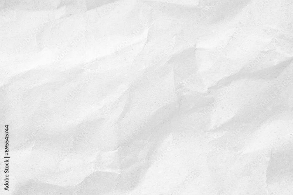 Fototapeta premium Crumpled white paper texture or background for design with copy space for text or image.