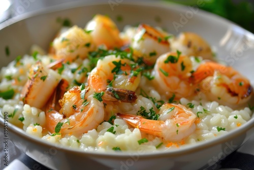 A bowl of seafood risotto, creamy and rich, with shrimp, scallops, and a hint of saffron, garnished with parsley.