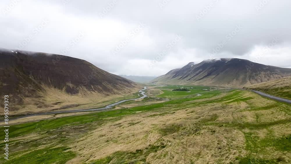 Majestic Drone Flyover of valley with creek in Iceland's Rugged Landscape. Majestic Drone Flyover of valley with creek in Iceland's Rugged Landscape.