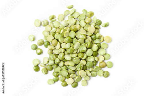 Split green peas pile on white background. Dry peas grains. Top view