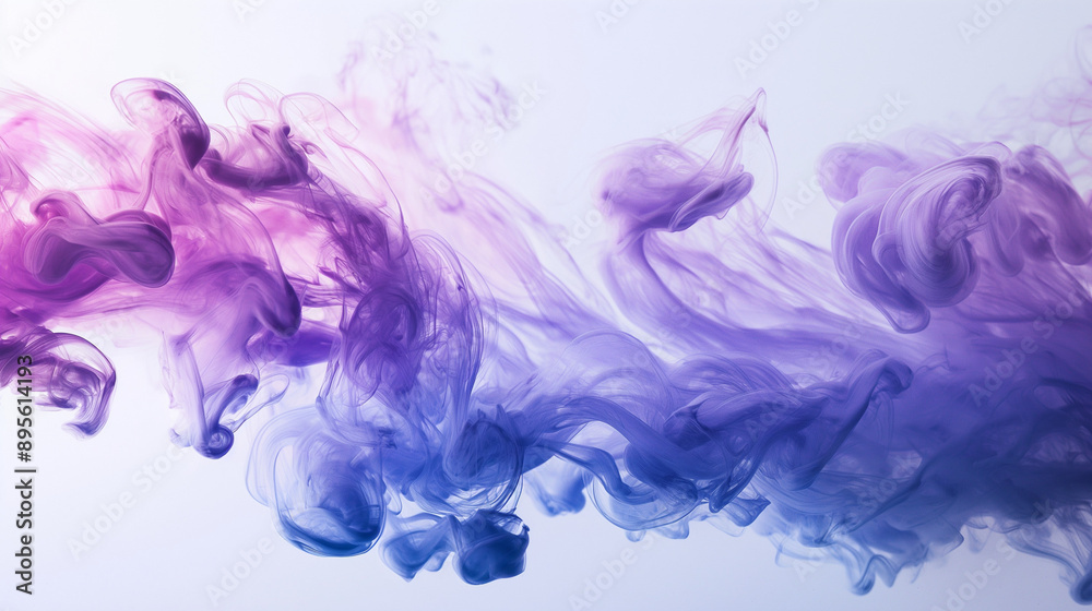 Flowing ink in water creating artistic shapes, fluid and dynamic