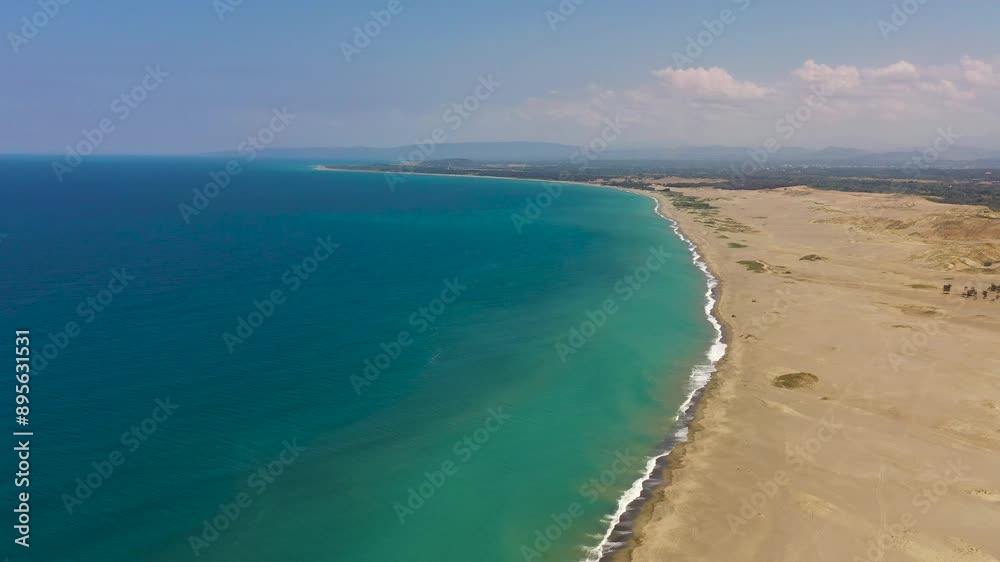 Tropical landscape with beautiful sandy beach and blue sea. Paoay Sand Dunes, Ilocos Norte, Philippines. Tropical landscape with beautiful sandy beach and blue sea. Paoay Sand Dunes, Ilocos Norte, Philippines.