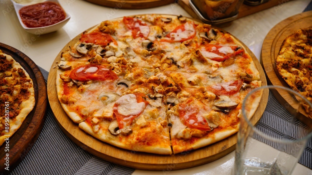Chicken and Mushroom Pizza on Wooden Board Chicken and Mushroom Pizza on Wooden Board