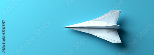 Paper airplane on a blue background