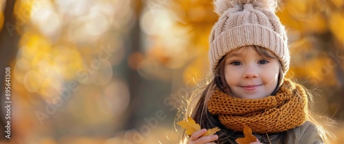 Girl Holding Autumn Leaf
