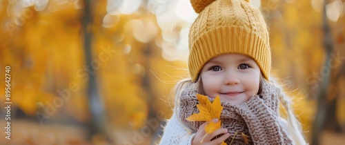 Girl Holding Autumn Leaf