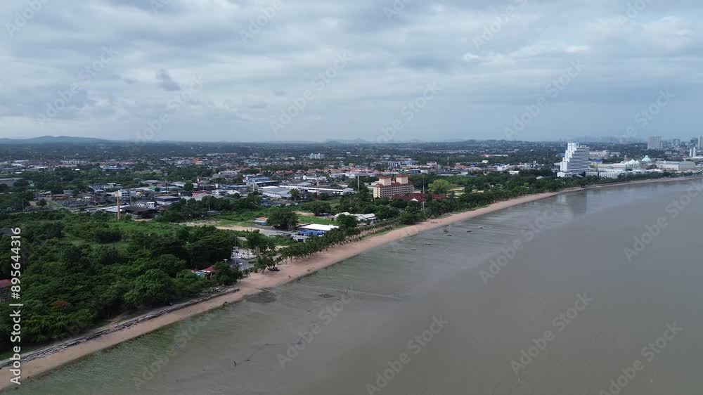 Aerial View of a Beach With a Wooden Pier and Palm Trees in Thailand Aerial View of a Beach With a Wooden Pier and Palm Trees in Thailand