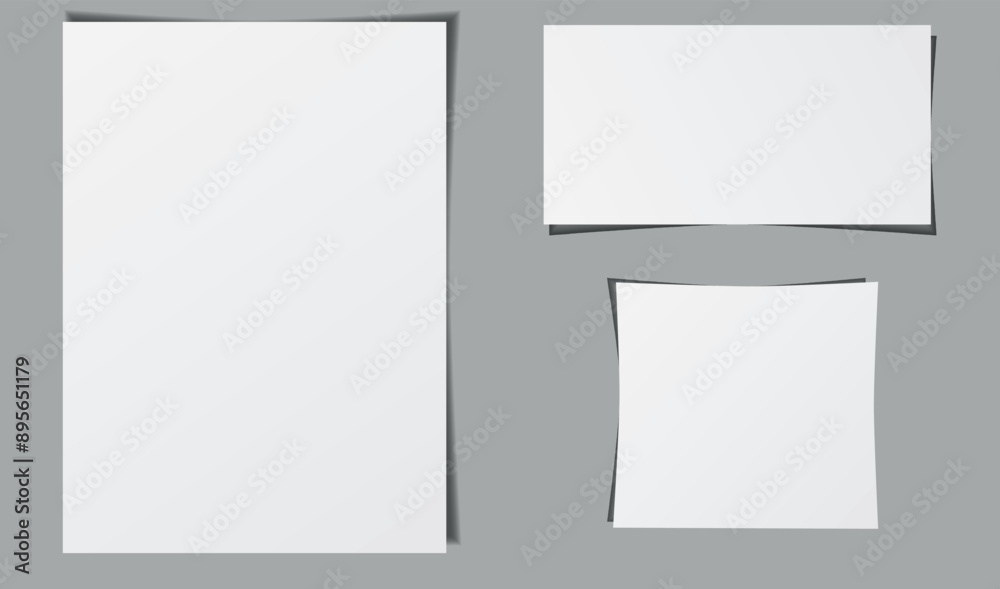 A blank page template. White blank pages of different sizes. Blank page with shadows. Blank sheets on grey. A blank page template. White blank pages of different sizes. Blank page with shadows. Blank sheets on grey.